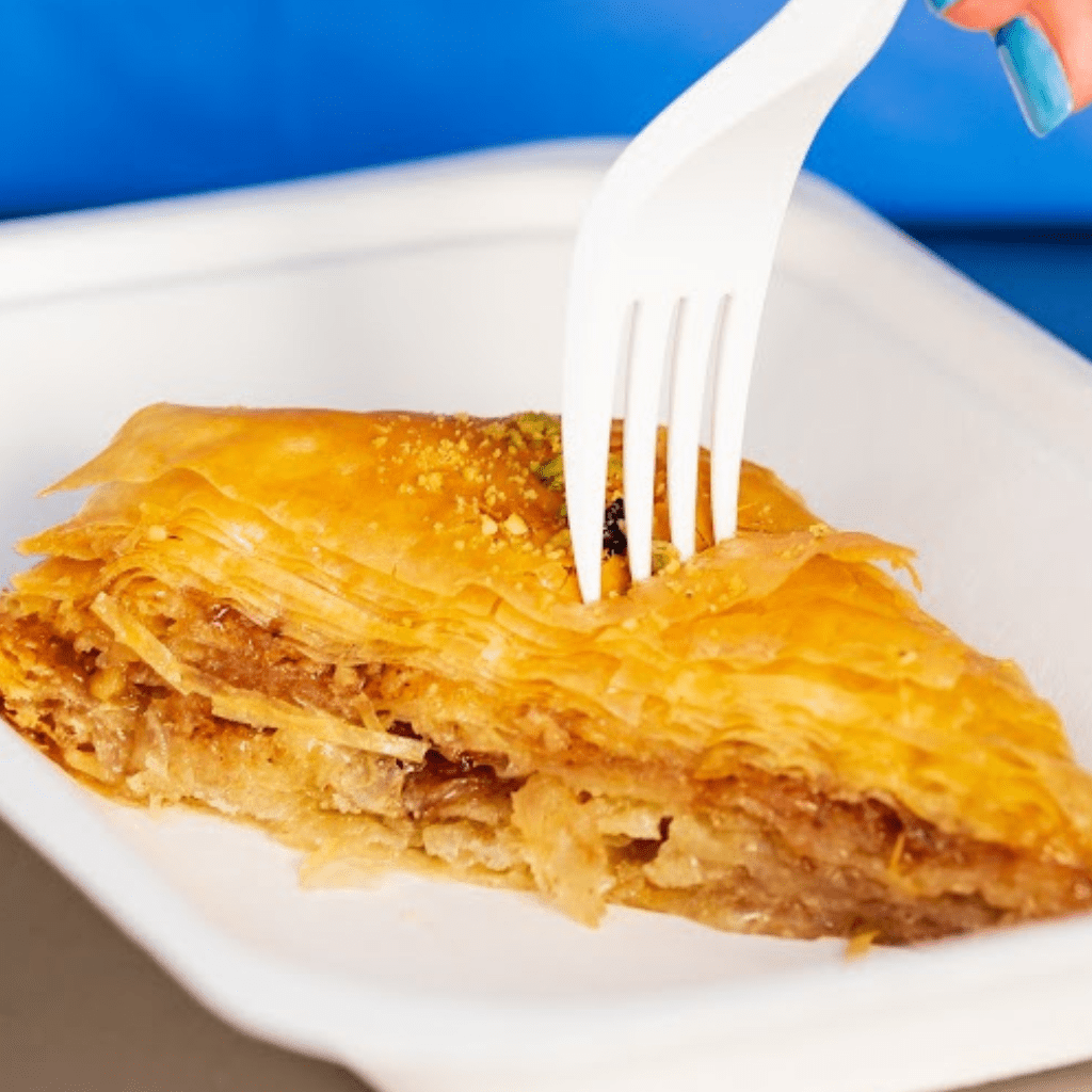Traditional Greek baklava made with filo pastry, nuts and sweet syrup.