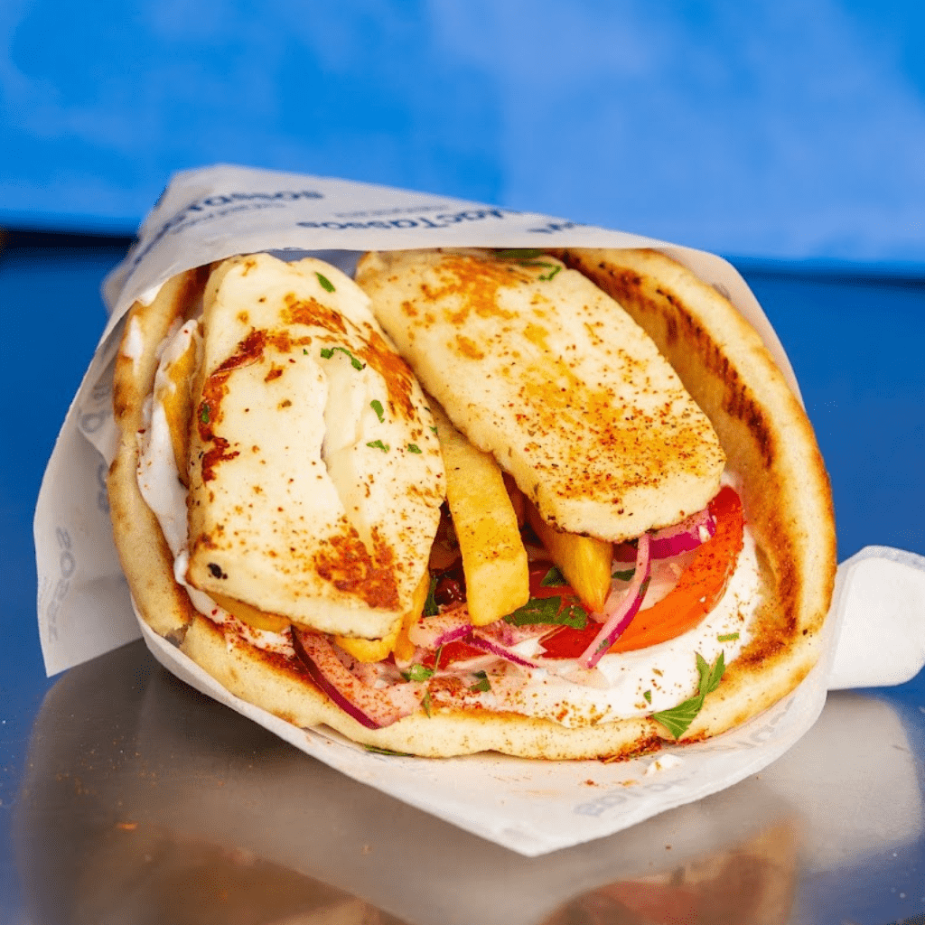 Vegetarian halloumi gyros wrap with grilled halloumi, tzatziki, salad and chips at MacTassos Silverburn.